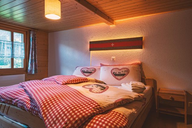 Schlafzimmer Ferienwohnung Chalet Rösi